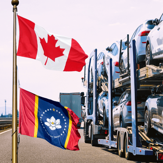 Open transport truck with Canadian flag and Louisiana state flag.